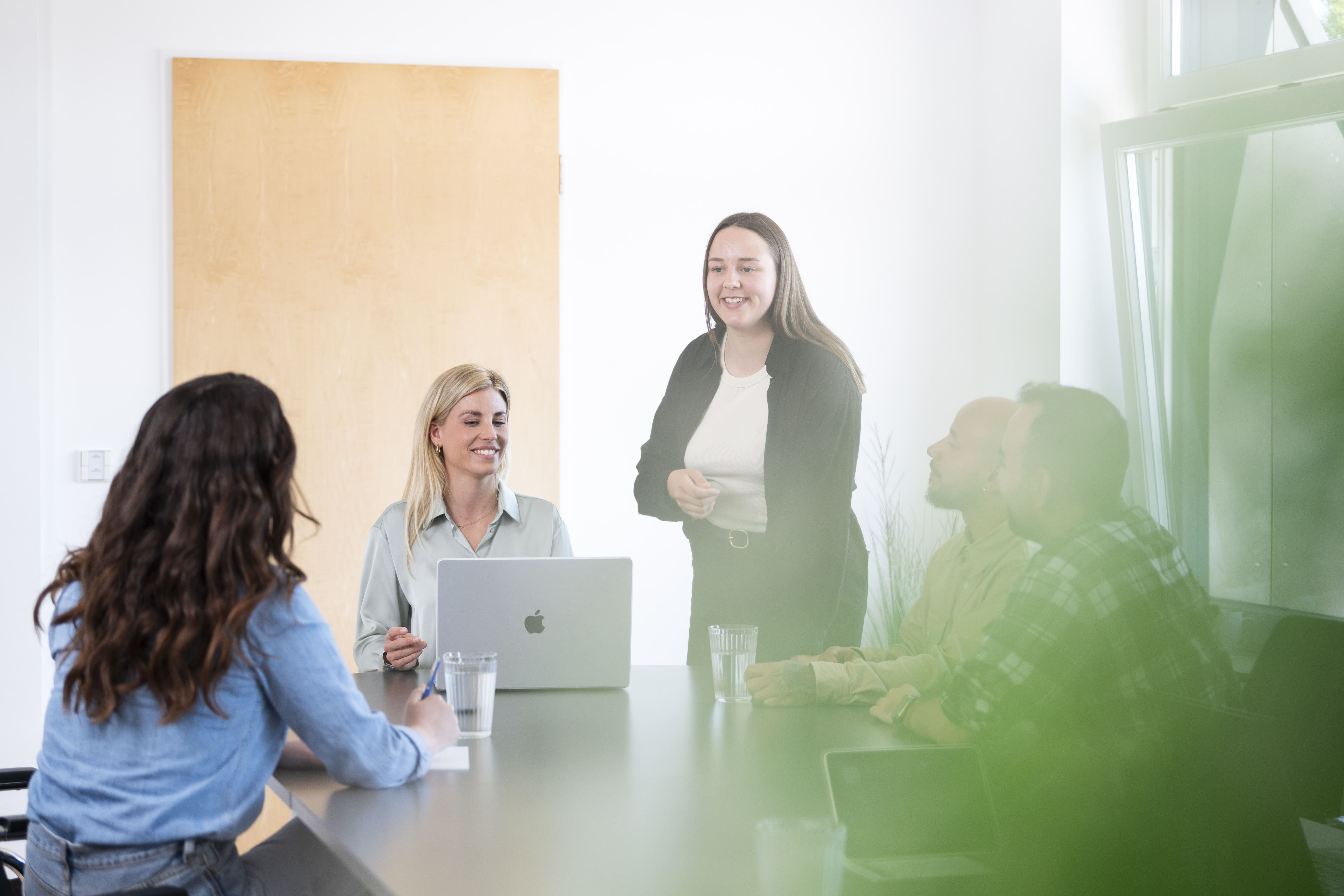 team in conference room, software and cloud